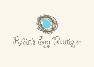 robin's egg boutique logo - blue egg in a nest